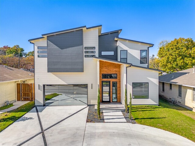 modern home with a front yard