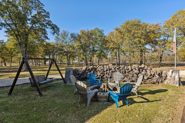 view of yard featuring a fire pit