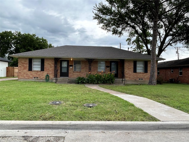 single story home with a front yard