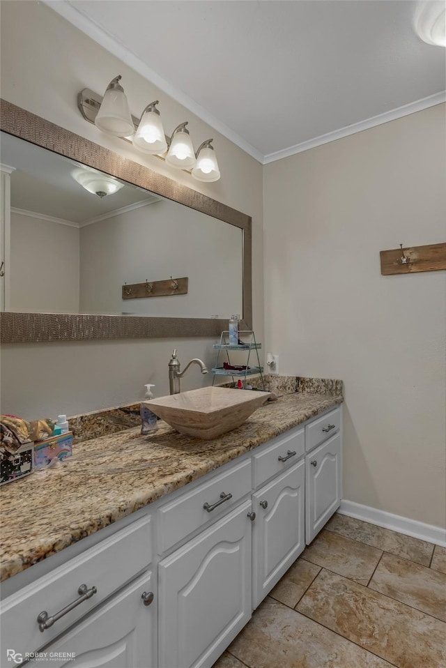 bathroom with vanity and crown molding