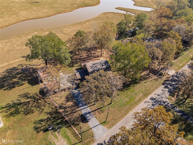 drone / aerial view featuring a water view and a rural view