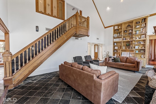 living room featuring high vaulted ceiling