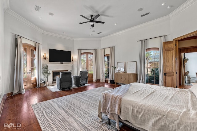 bedroom featuring multiple windows, ceiling fan, crown molding, and dark hardwood / wood-style floors