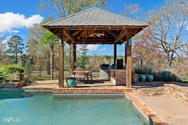 view of swimming pool featuring a gazebo, area for grilling, a patio area, and ceiling fan