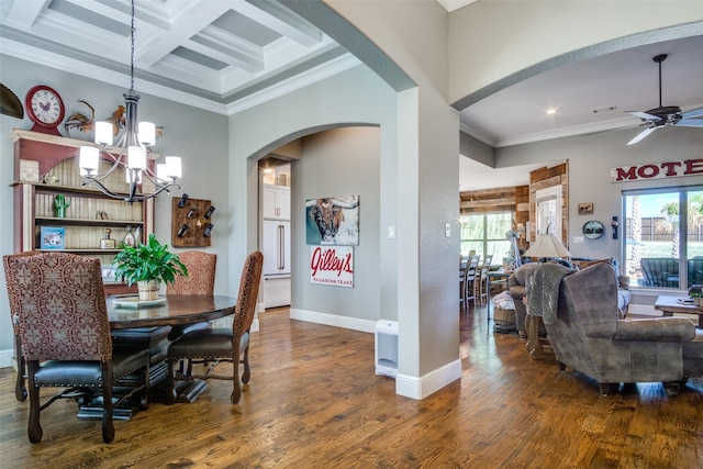 dining space featuring coffered ceiling, ceiling fan with notable chandelier, crown molding, dark hardwood / wood-style floors, and beam ceiling