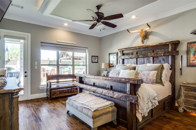 bedroom featuring access to exterior, ceiling fan, multiple windows, and dark hardwood / wood-style floors