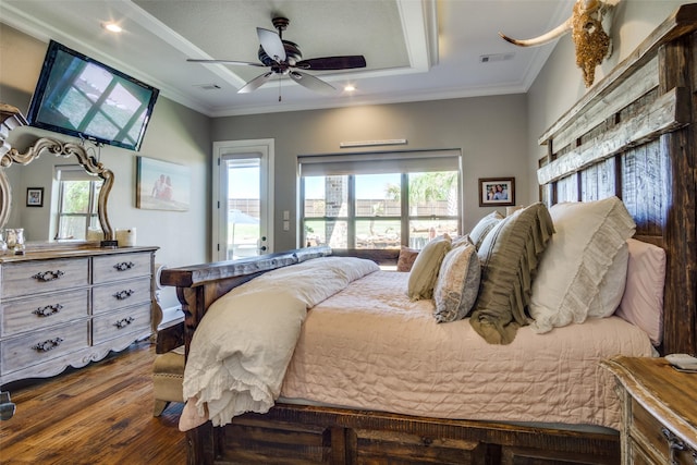 bedroom with ornamental molding, multiple windows, dark wood-type flooring, and ceiling fan