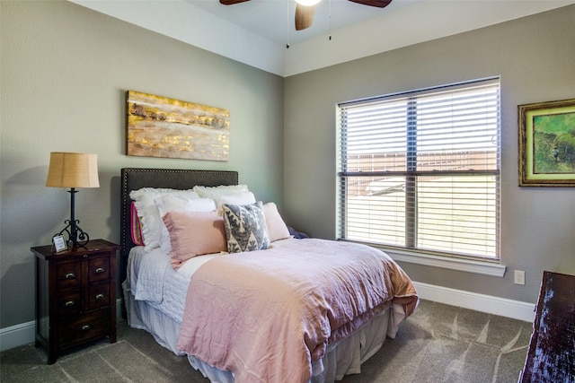 carpeted bedroom with multiple windows and ceiling fan