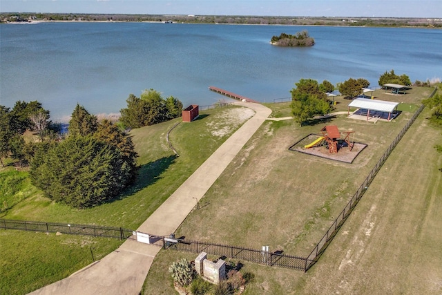 birds eye view of property with a water view