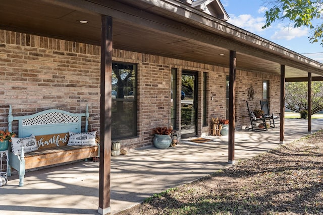 view of patio featuring a porch