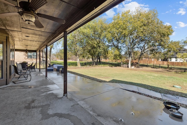 view of patio featuring ceiling fan