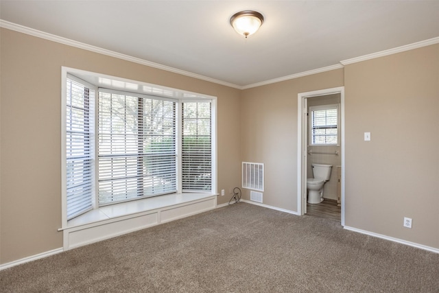 carpeted spare room with ornamental molding