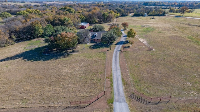 birds eye view of property featuring a rural view