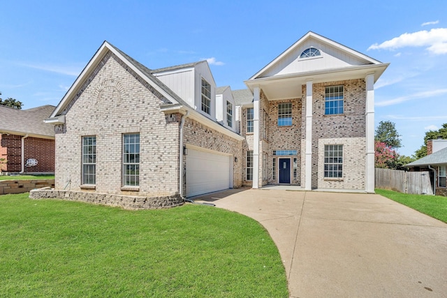 neoclassical home featuring a garage and a front lawn