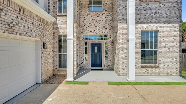 doorway to property featuring a garage