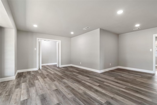 unfurnished room featuring wood-type flooring