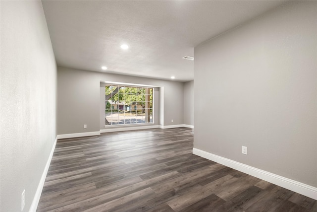 interior space with dark wood-type flooring