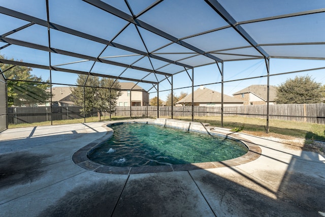 view of pool featuring a lanai and a patio