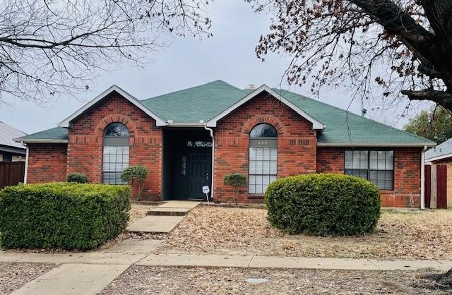 ranch-style home with brick siding