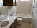 full bathroom featuring tile patterned floors, vanity, toilet, and bathing tub / shower combination