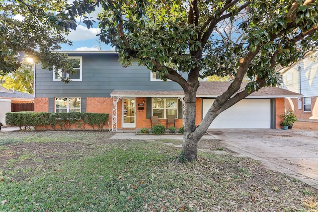 view of front of home with a porch and a garage