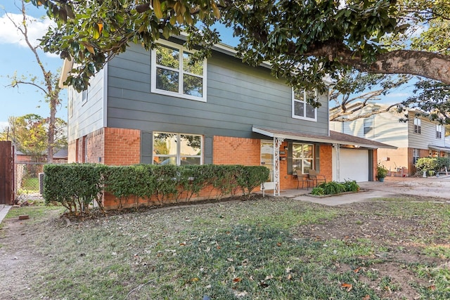 front facade with a garage