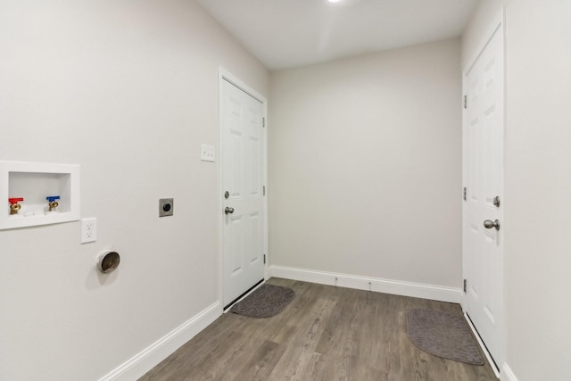 washroom with washer hookup, wood-type flooring, and hookup for an electric dryer