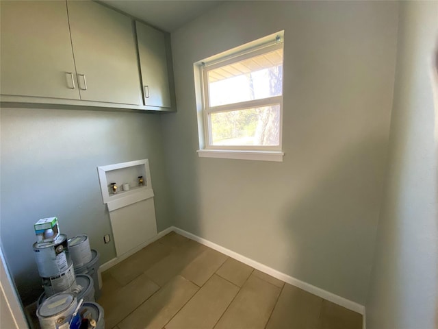 laundry room featuring cabinets, washer hookup, and hardwood / wood-style floors