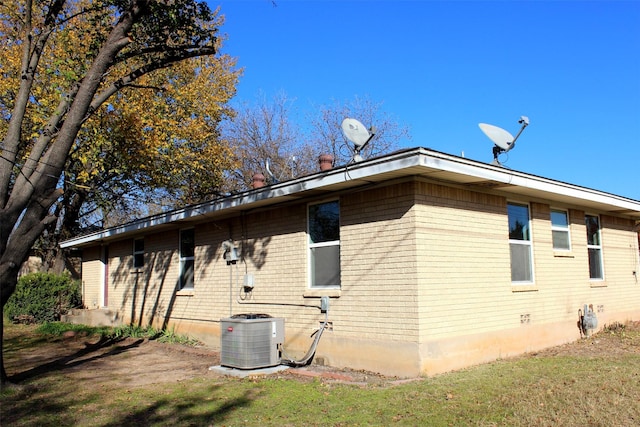 view of property exterior featuring central AC unit