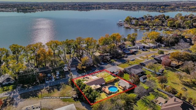 birds eye view of property featuring a water view