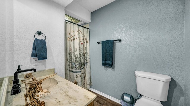 kitchen featuring gray cabinets, appliances with stainless steel finishes, tasteful backsplash, crown molding, and light hardwood / wood-style flooring