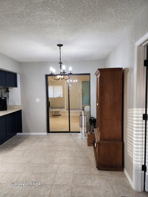 garage with fridge and a garage door opener