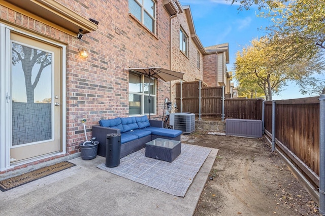 view of patio with outdoor lounge area and central air condition unit