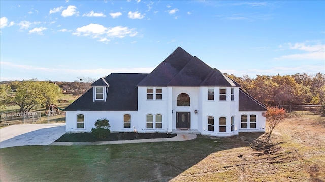 view of front of property with a front lawn