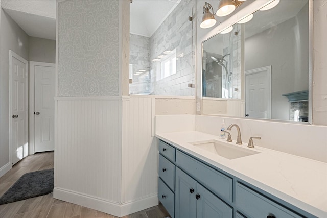 bathroom featuring vanity and hardwood / wood-style flooring