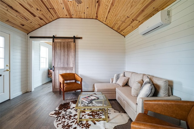 living room featuring vaulted ceiling, an AC wall unit, wood-type flooring, wood ceiling, and a barn door