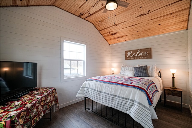 bedroom with dark wood-type flooring, wooden ceiling, ceiling fan, and vaulted ceiling