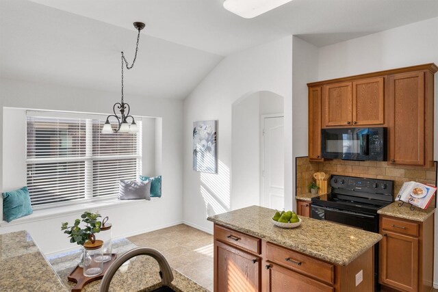 kitchen with pendant lighting, backsplash, black appliances, vaulted ceiling, and a notable chandelier