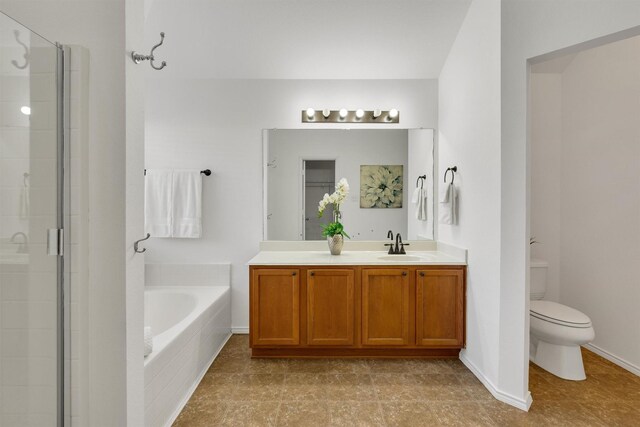 full bathroom featuring plus walk in shower, vanity, toilet, and tile patterned flooring