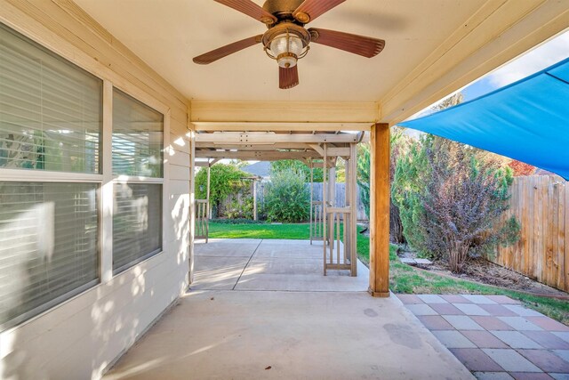 view of patio / terrace featuring ceiling fan