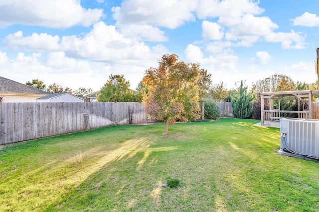 view of yard with central AC