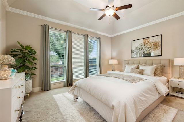 bedroom featuring ceiling fan, light colored carpet, and crown molding