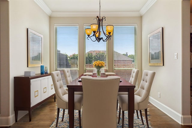 dining space with a chandelier, dark wood-type flooring, and a healthy amount of sunlight