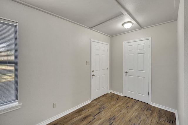 empty room featuring dark hardwood / wood-style floors