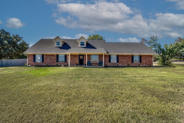 view of front of home featuring a front yard