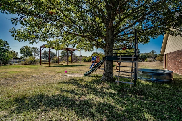 view of play area featuring a yard