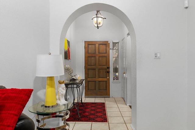 foyer entrance with light tile patterned floors