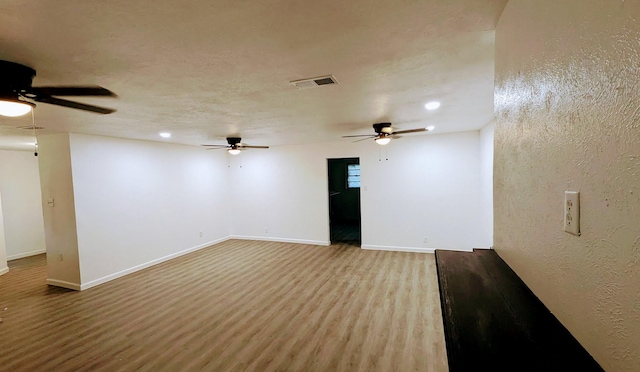 empty room featuring hardwood / wood-style floors