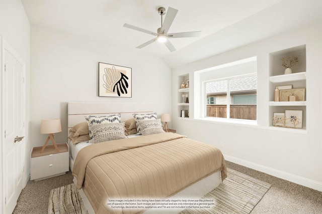 carpeted bedroom featuring vaulted ceiling, ceiling fan, and baseboards