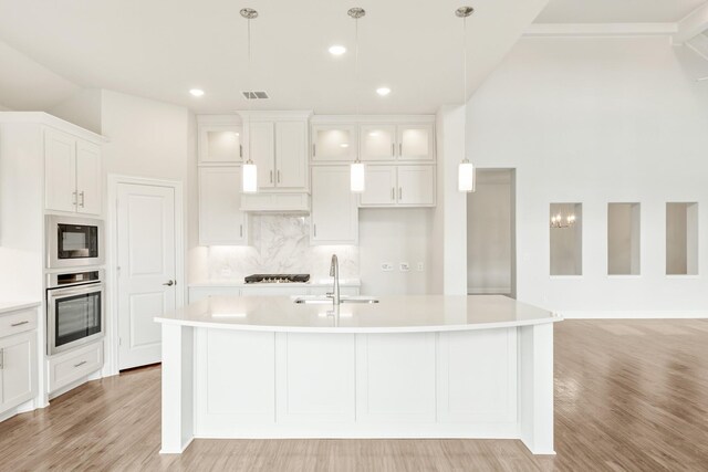 bathroom with separate shower and tub and vanity